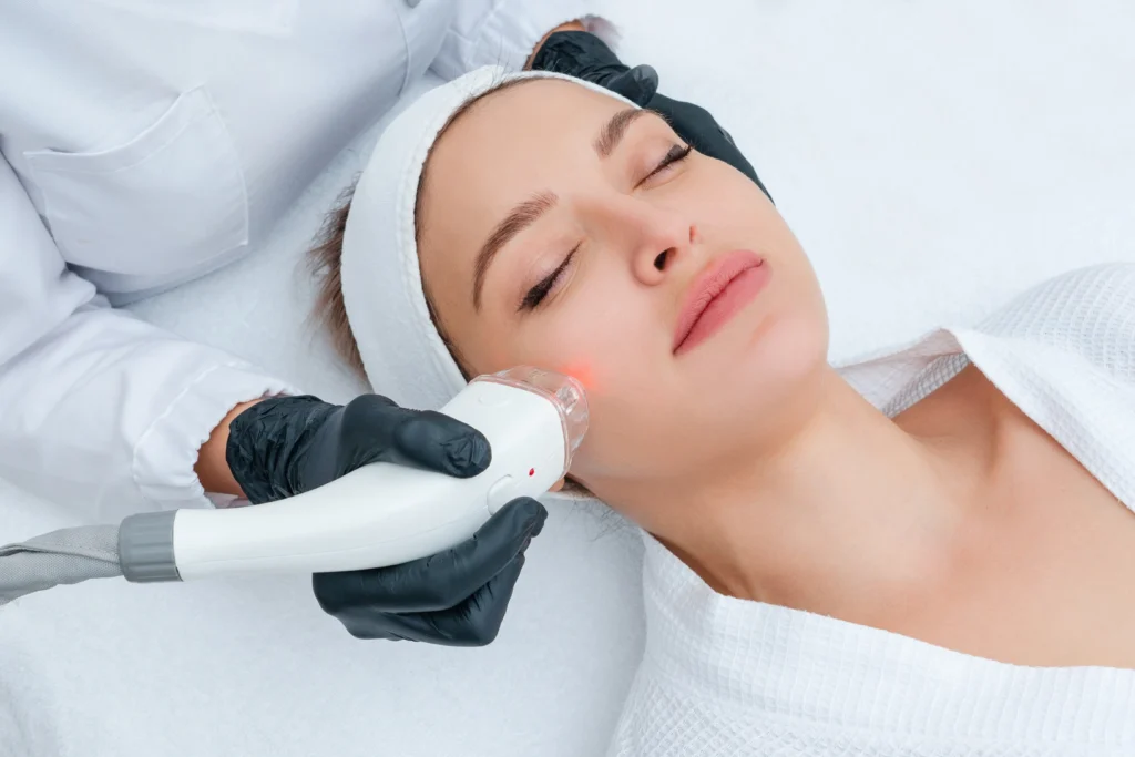 A woman receiving a face massage in Fremont, CA