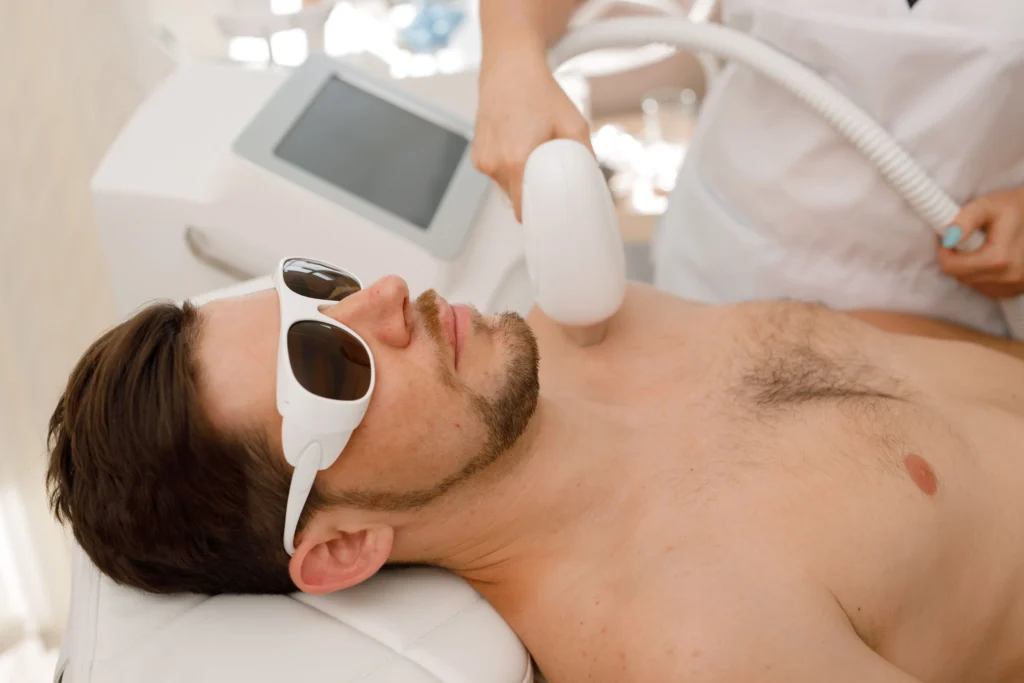 a man lying down receiving laser treatment in Fremont, CA